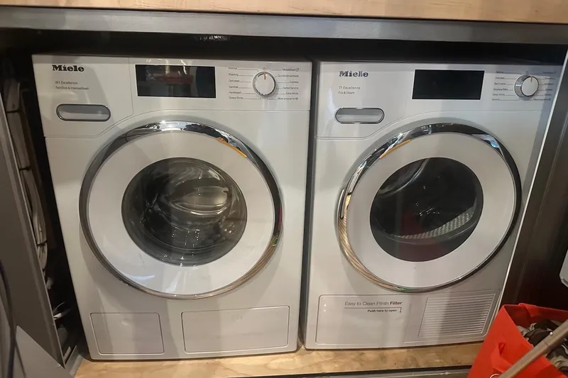 First Home Yacht Photos Pics Miele washer and dryer set in a Cheoy Lee 92 yacht, 1988 model.