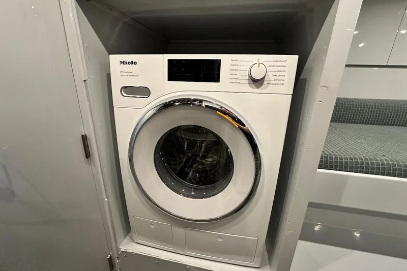 First Home Yacht Photos Pics Miele washing machine in 1988 Cheoy Lee 92 yacht interior.