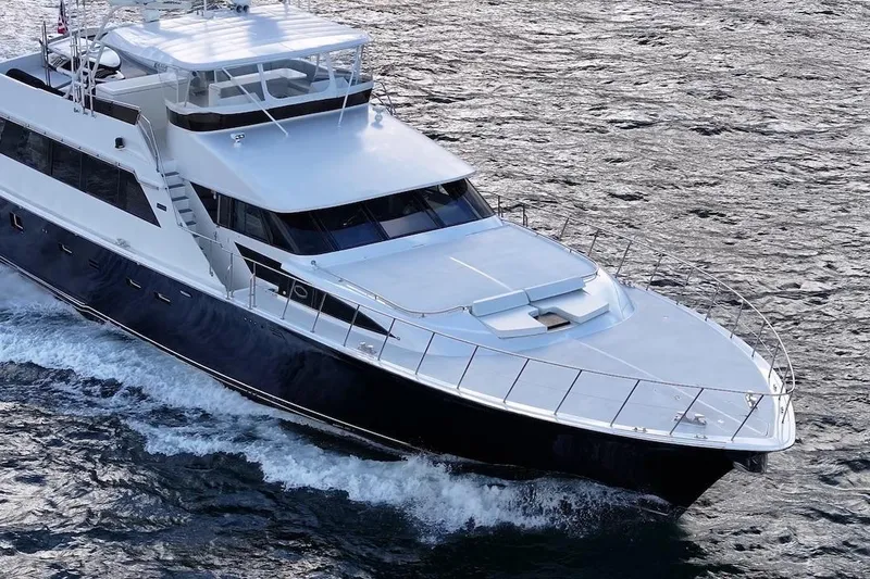 First Home Yacht Photos Pics 1988 Cheoy Lee 92 yacht cruising on open water.