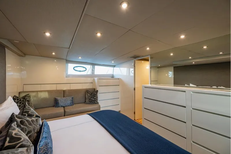 First Home Yacht Photos Pics Luxurious interior of 1988 Cheoy Lee 92 yacht with modern furnishings and ambient lighting.