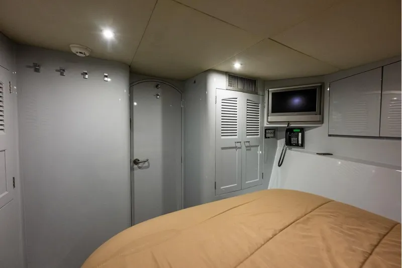 First Home Yacht Photos Pics Luxurious cabin interior of 1988 Cheoy Lee 92 yacht with modern amenities.