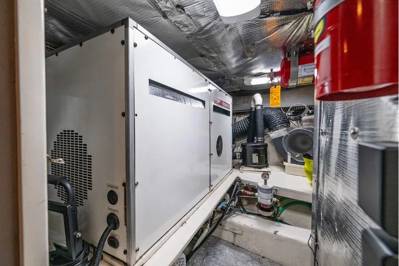 First Home Yacht Photos Pics Engine room of 1988 Cheoy Lee 92 yacht, featuring machinery and equipment.