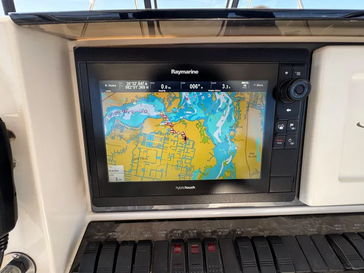 Last Mango Yacht Photos Pics Raymarine navigation display on 2007 Sea Ray 52 Sedan Bridge yacht dashboard.