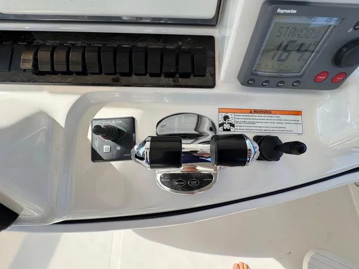 Last Mango Yacht Photos Pics Control panel of a 2007 Sea Ray 52 Sedan Bridge yacht with navigation instruments.