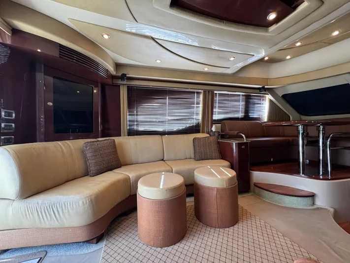 Last Mango Yacht Photos Pics Luxurious interior of a 2007 Sea Ray 52 Sedan Bridge yacht with elegant seating.