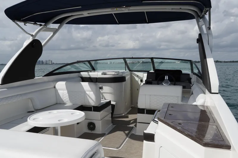  Yacht Photos Pics 2018 Sea Ray SDX 290 boat interior with luxurious seating and modern design on open water.
