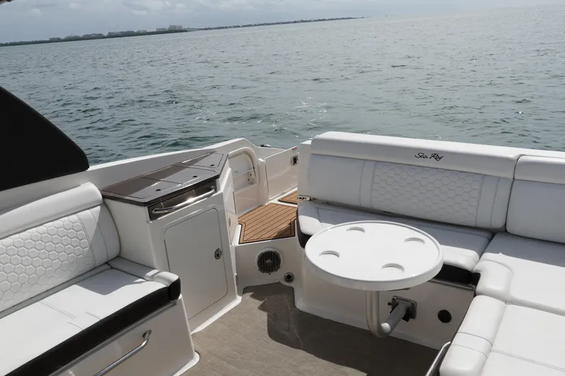  Yacht Photos Pics 2018 Sea Ray SDX 290 boat interior with white seating and ocean view.
