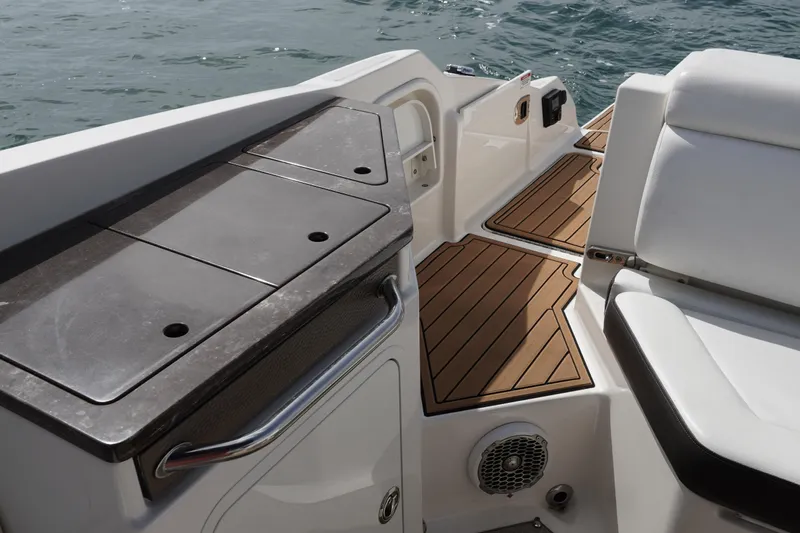  Yacht Photos Pics 2018 Sea Ray SDX 290 boat interior with teak flooring and seating.