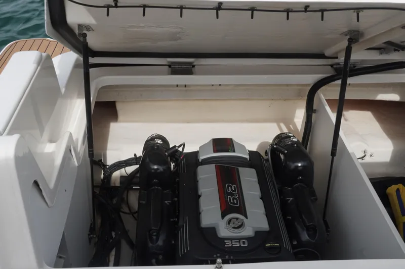 Yacht Photos Pics Engine compartment of a 2018 Sea Ray SDX 290 boat, showcasing a powerful 6.2L engine.
