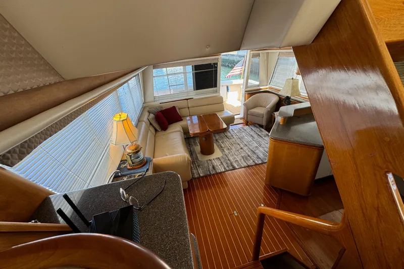 Alexandra Yacht Photos Pics Interior of 1998 Bayliner 4788 Pilot House Motoryacht with elegant seating and wooden finishes.