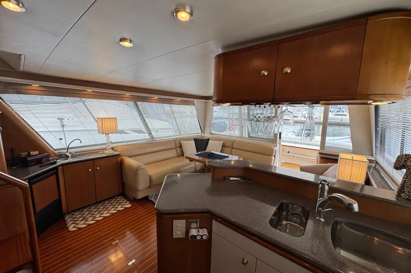 Alexandra Yacht Photos Pics Luxurious interior of 1998 Bayliner 4788 Pilot House Motoryacht with elegant furnishings.