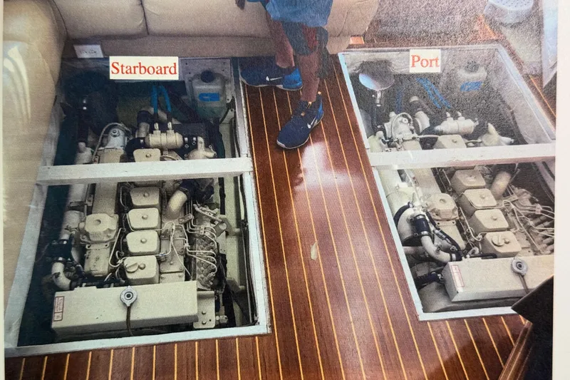 Alexandra Yacht Photos Pics 1998 Bayliner 4788 Pilot House Motoryacht engine room with starboard and port engines visible.