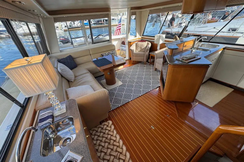 Alexandra Yacht Photos Pics Luxurious interior of 1998 Bayliner 4788 Pilot House Motoryacht with elegant seating and modern amenities.