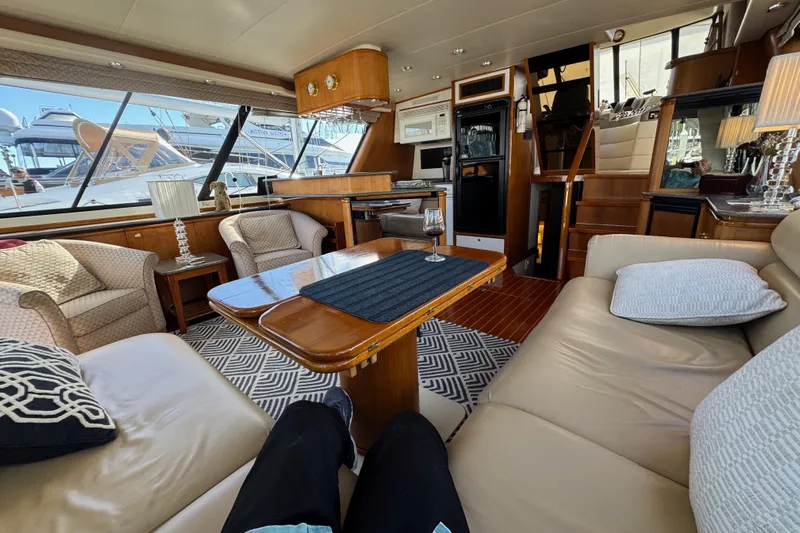 Alexandra Yacht Photos Pics Luxurious interior of 1998 Bayliner 4788 Pilot House Motoryacht with elegant seating and decor.