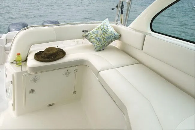  Yacht Photos Pics Manufacturer Provided Image: 2013 Pursuit OS 315 Offshore boat interior with white seating, cushion, and hat.