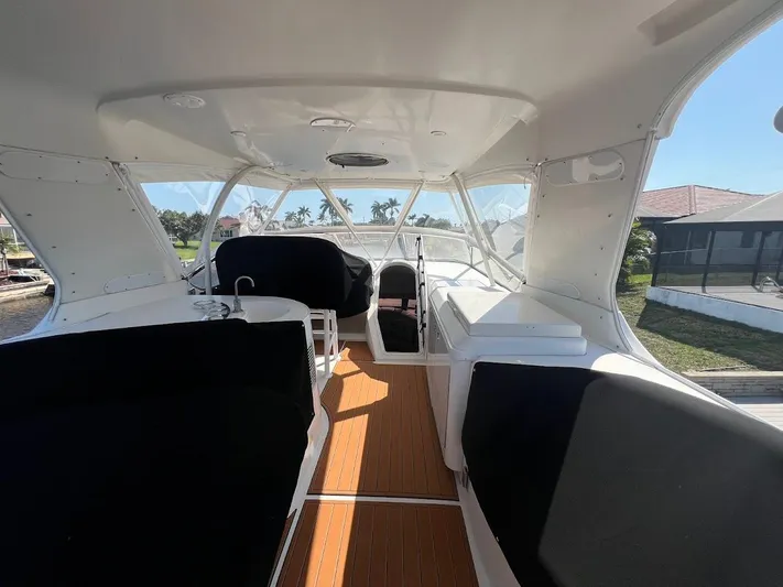 Roweboat Yacht Photos Pics Interior view of 2006 Carver 56 Voyager yacht with spacious seating and sleek design.