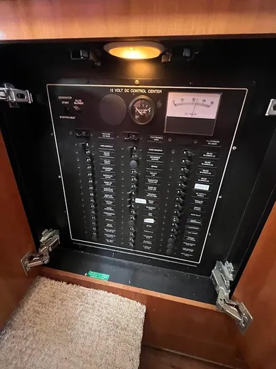 Roweboat Yacht Photos Pics Electrical control panel in a 2006 Carver 56 Voyager yacht, featuring switches and gauges.