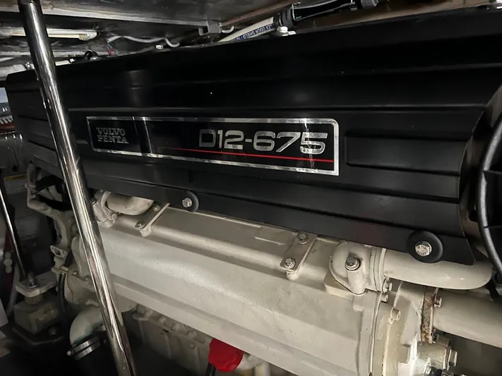 Roweboat Yacht Photos Pics Volvo Penta D12-675 engine in a 2006 Carver 56 Voyager yacht.