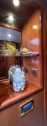 Roweboat Yacht Photos Pics Luxurious interior of 2006 Carver 56 Voyager yacht with elegant wooden cabinetry and decorative accents.