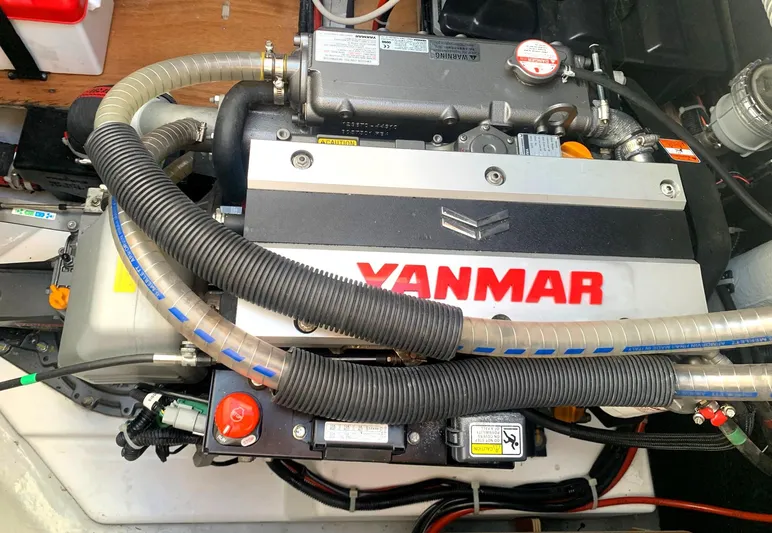 Martina Yacht Photos Pics Yanmar engine in a 2021 Lagoon 46 catamaran, showcasing detailed components and branding.