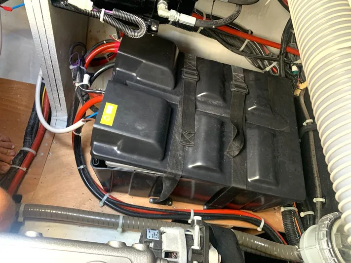 Martina Yacht Photos Pics Battery compartment of a 2021 Lagoon 46 catamaran with wiring and secure straps.