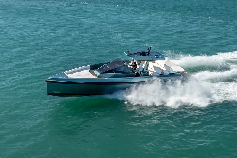 Wally Yacht Photos Pics 2021 Wally 48 Wally Tender cruising on open water, showcasing sleek design and performance.