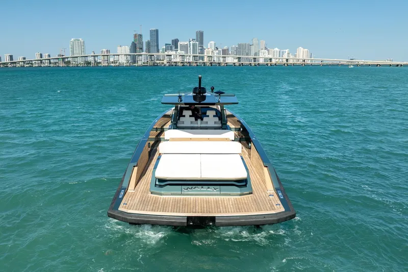 Wally Yacht Photos Pics 2021 Wally 48 Wally Tender yacht cruising near city skyline.