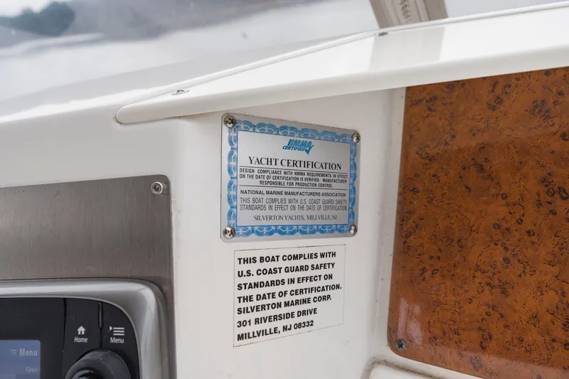 Water Cave Yacht Photos Pics 2005 Silverton 34 Convertible yacht certification and safety compliance plaques.