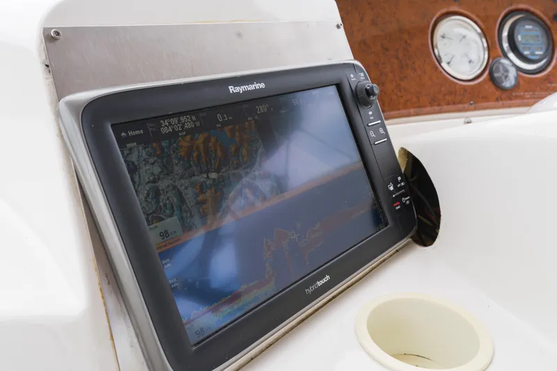 Water Cave Yacht Photos Pics Raymarine navigation system on 2005 Silverton 34 Convertible boat dashboard.