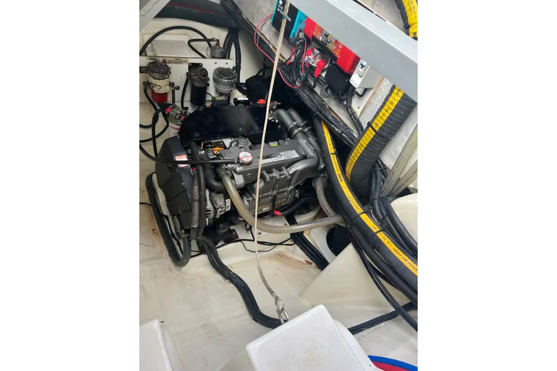 One Love Yacht Photos Pics Engine compartment of a 2019 Leopard 50 yacht, showcasing detailed wiring and components.