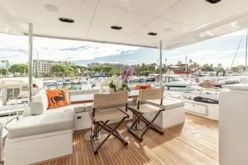  Yacht Photos Pics Luxurious 2020 Azimut Fly 72 yacht deck with seating, overlooking marina.
