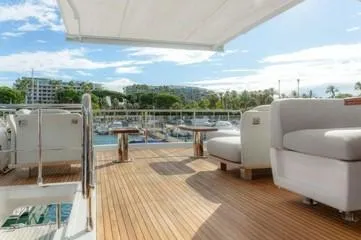  Yacht Photos Pics Luxurious deck of 2020 Azimut Fly 72 yacht with marina view.