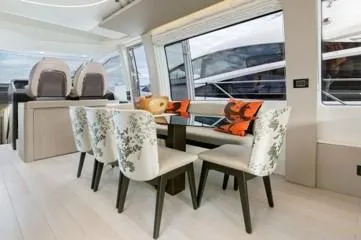  Yacht Photos Pics Luxurious interior of 2020 Azimut Fly 72 yacht with elegant dining area.