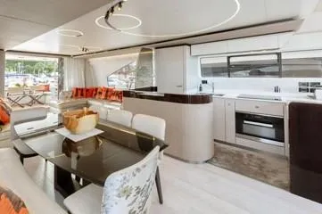  Yacht Photos Pics Luxurious interior of 2020 Azimut Fly 72 yacht with modern kitchen and dining area.