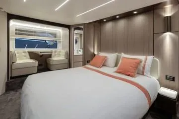  Yacht Photos Pics Luxurious bedroom interior of 2020 Azimut Fly 72 yacht with modern design and elegant lighting.