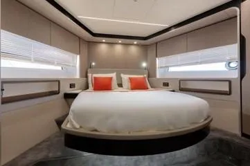  Yacht Photos Pics Luxurious bedroom interior of 2020 Azimut Fly 72 yacht with modern design and elegant decor.