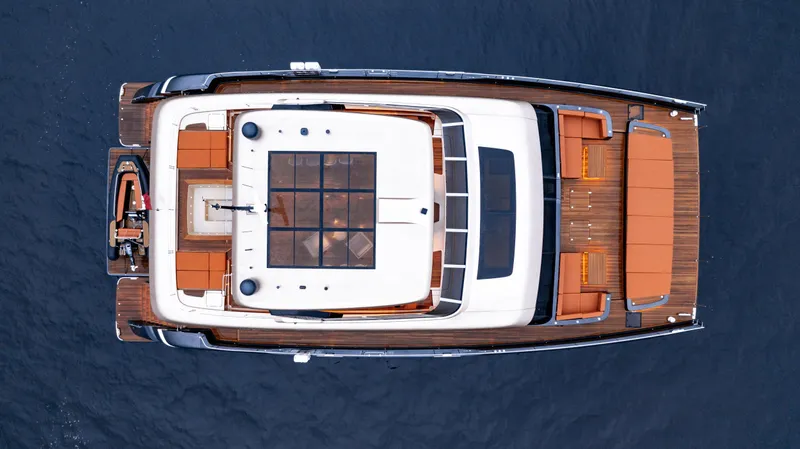  Yacht Photos Pics Aerial view of 2026 Sunreef 100 Sunreef Power yacht on the ocean.