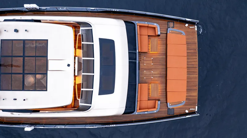  Yacht Photos Pics Top view of 2026 Sunreef 100 Sunreef Power yacht with sleek design and spacious deck.