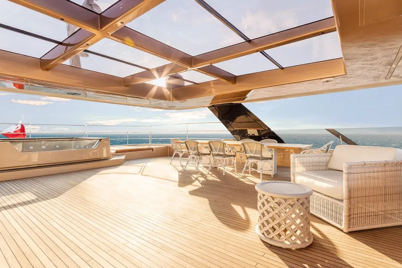  Yacht Photos Pics Luxurious Sunreef 100 Power yacht deck with seating, ocean view, and modern design, 2026 model.