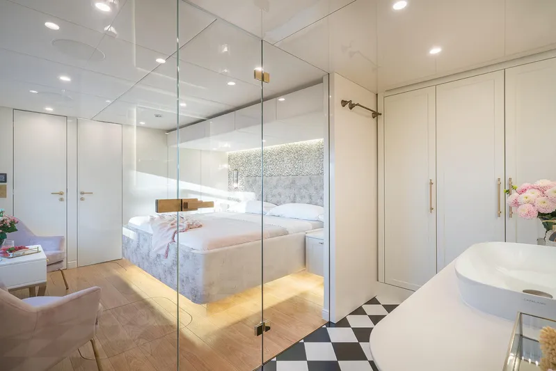  Yacht Photos Pics Luxurious bedroom interior of 2026 Sunreef 100 Sunreef Power yacht with modern design.