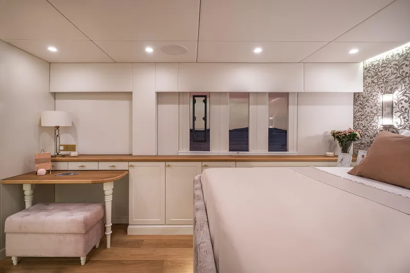  Yacht Photos Pics Luxurious bedroom interior of 2026 Sunreef 100 Power yacht with elegant decor and soft lighting.