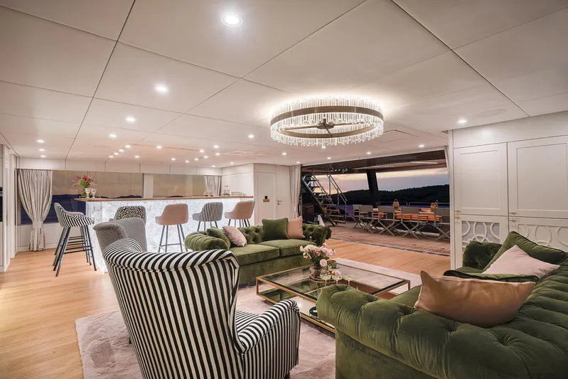  Yacht Photos Pics Luxurious interior of 2026 Sunreef 100 Power yacht with elegant seating and modern lighting.