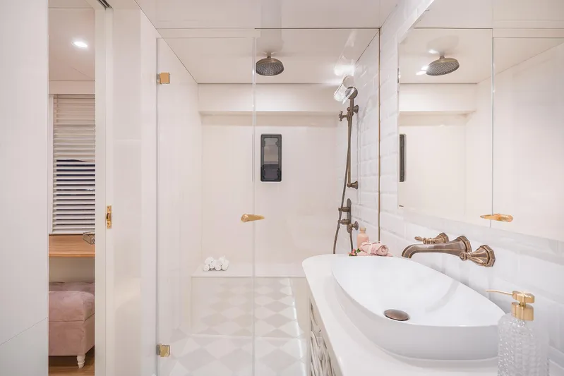  Yacht Photos Pics Luxurious bathroom on 2026 Sunreef 100 Sunreef Power yacht with modern fixtures and elegant design.