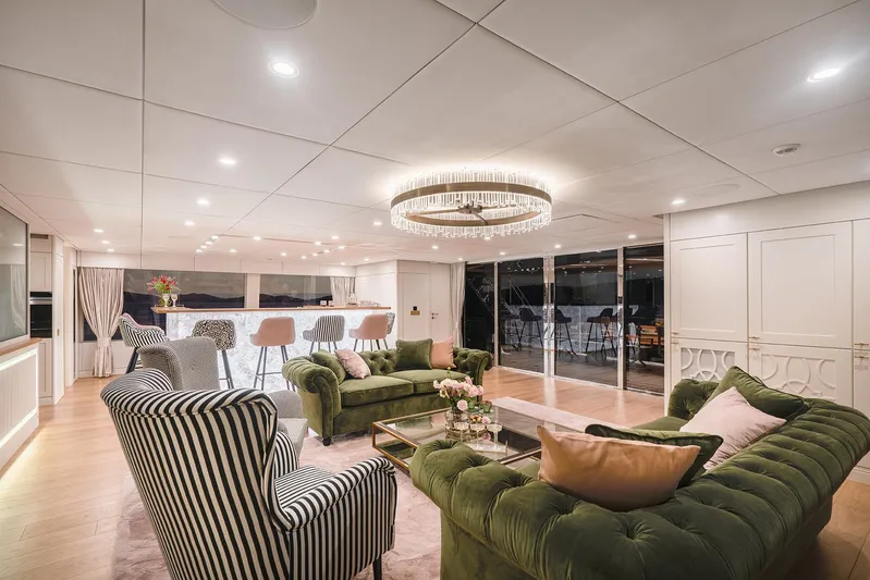  Yacht Photos Pics Luxurious interior of 2026 Sunreef 100 Power yacht with elegant seating and modern decor.