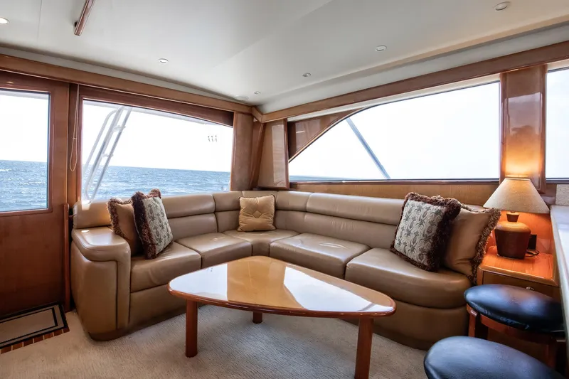 Good To Go Yacht Photos Pics Luxurious interior of 2002 Viking 61 yacht with leather seating and ocean view.