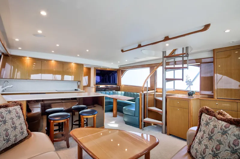 Good To Go Yacht Photos Pics Luxurious interior of a 2002 Viking 61 yacht with modern furnishings and elegant design.