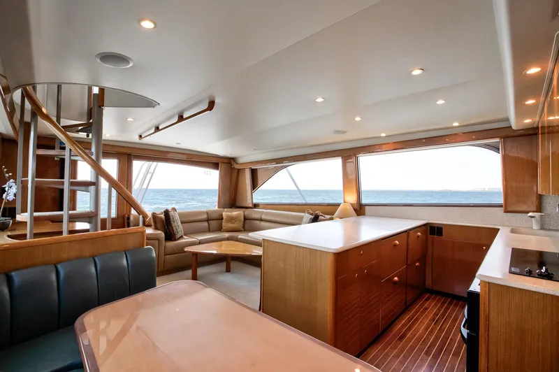 Good To Go Yacht Photos Pics Luxurious interior of 2002 Viking 61 yacht with modern furnishings and ocean view.