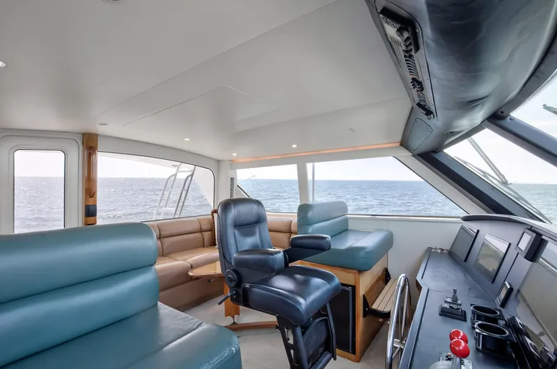 Good To Go Yacht Photos Pics Luxurious interior of 2002 Viking 61 yacht with leather seating and ocean view.