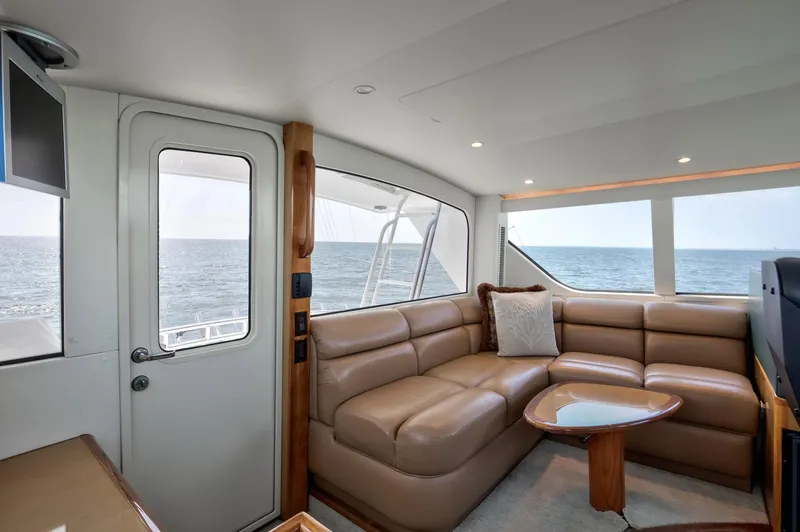 Good To Go Yacht Photos Pics Luxurious interior of 2002 Viking 61 yacht with leather seating and ocean view.