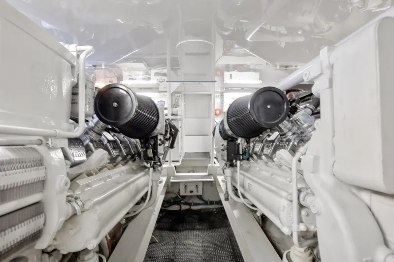 Good To Go Yacht Photos Pics Engine room of a 2002 Viking 61 yacht, featuring dual powerful engines.